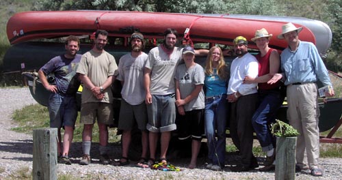 Canoe paddlers with the loaded canoe trailer.