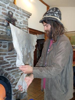 Softening a deer hide.