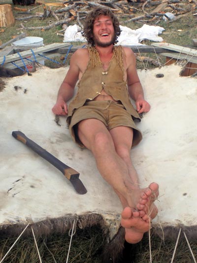 Michael resting on a bison hide.