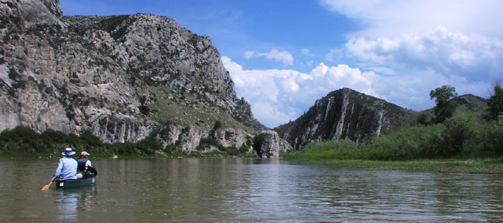 Paddling by Sappington Bluffs on the Jefferson River.